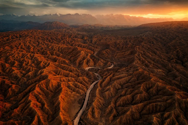 Ak Sai Canyons during golden sunset from above